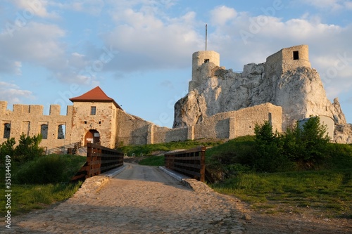 Beautiful view of the medieval castle at sunset light. Rabsztyn Castle on Eagles Nests trail. Medieval fortress in the Jura region near and Cracow. Poland.