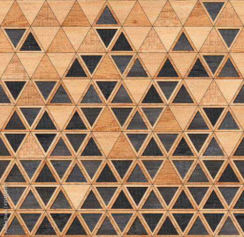 Brown and black wooden wall with triangle pattern. 