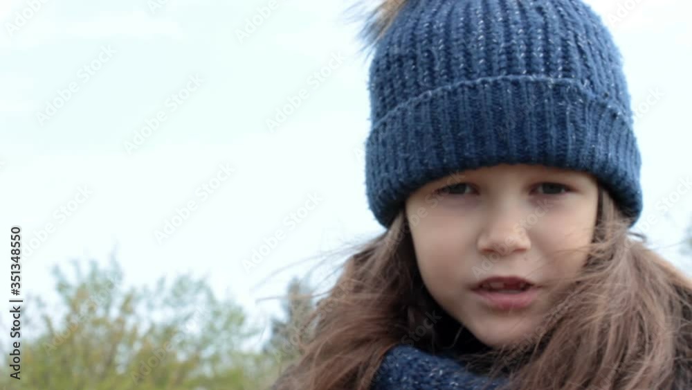 Portrait of a little girl in a rural garden Portrait of a little girl in a rural garden