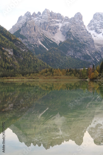Reflection of the mountain in the Dolomites at autumn 