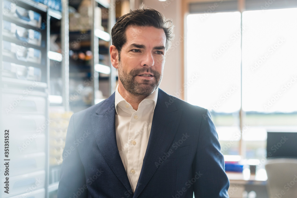 Portrait of confident businessman in a factory Portrait of confident businessman in a factory