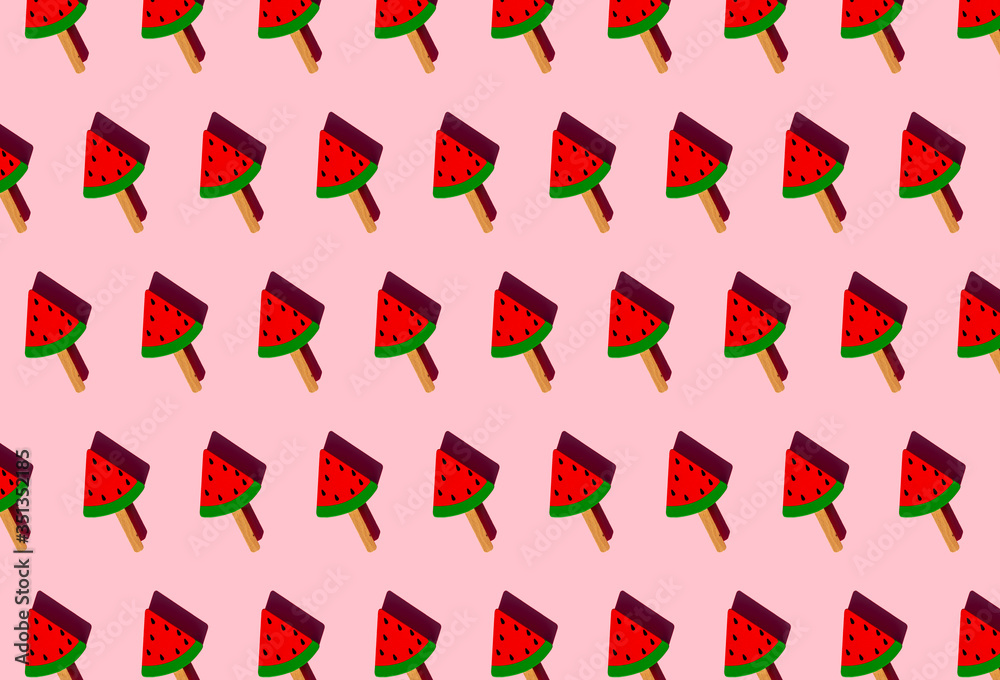 Pattern of popsicle sticks with toy watermelon slices Pattern of popsicle sticks with toy watermelon slices