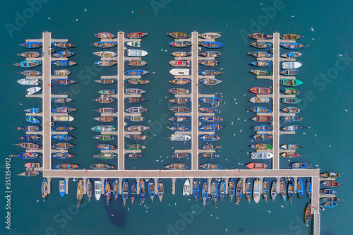 Portugal, Aveiro, Drone view of boats moored in marina