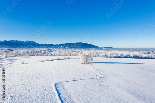 Germany, Bavaria, Greiling, Drone view of snow-covered Alpine foothills