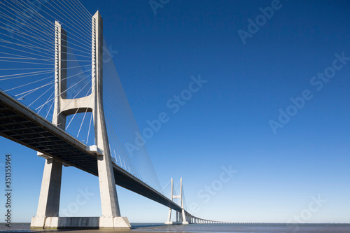 Portugal, Lisbon, View of Vasco da Gama bridge at River Tagus photo