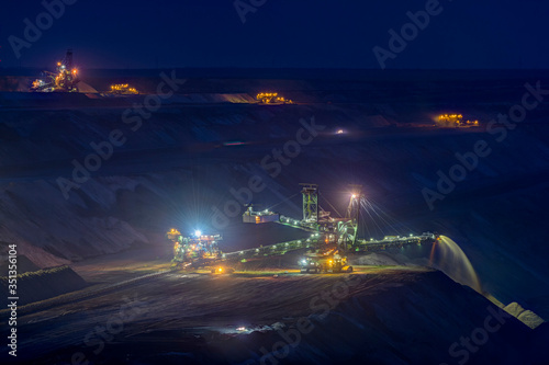 Germany, Juechen, lighted spreader at brown coal mining Garzweiler by night photo