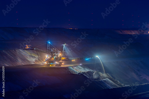 Germany, Juechen, lighted spreader at brown coal mining Garzweiler photo
