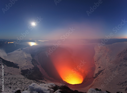 Chile, Villarica volcano erupting at crater lake photo