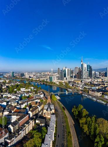 Wallpaper Mural Germany, Hesse, Frankfurt, Helicopter view of clear blue sky over riverside city with downtown skyscrapers in background Torontodigital.ca