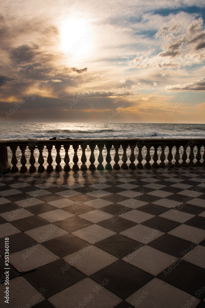 Sunset from Mascagni terrace in Livorno with stormy sea