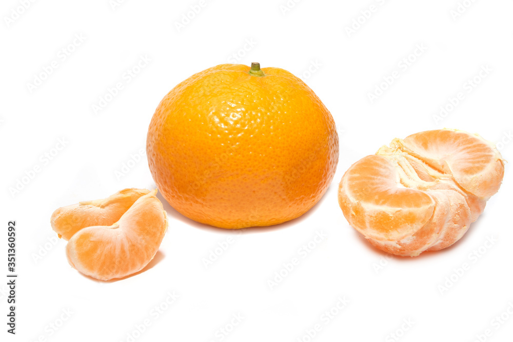 Mandarin isolated on a white background. The symbol of the holiday season. Mandarin isolated on a white background. The symbol of the holiday season.