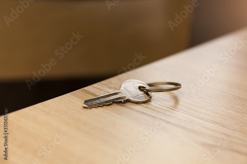 Keys on the ring on table in a room