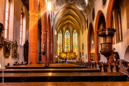 Limburg, Germany - 21st May 2020: A german photographer visiting the city, taking pictures of the interior of the town church. © ms_pics_and_more