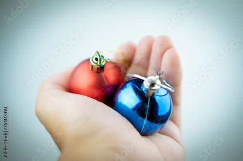 hand holding christmas ball