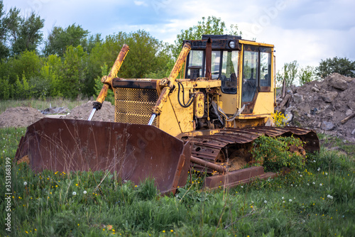 an old abandoned crawler bulldozer © senssnow
