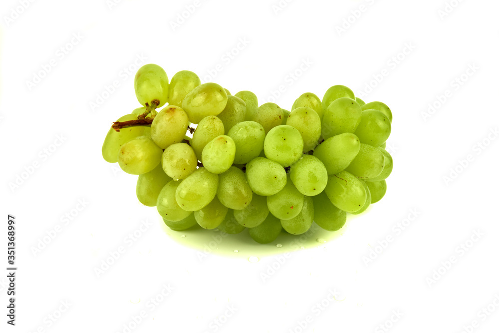 Bunch of grapes and raisins on a white background. Wine grapes, table grapes. Fresh fruit.