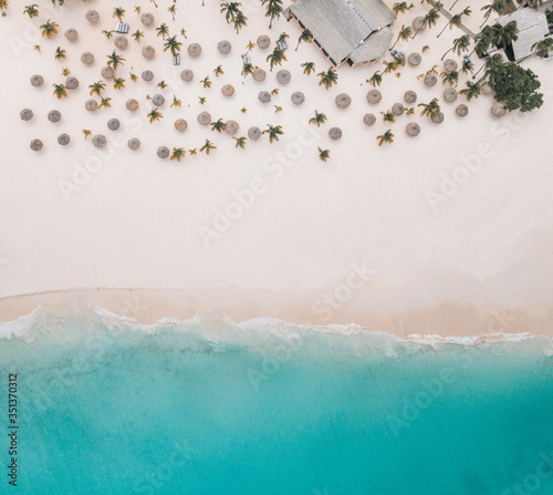 Drone shot of Aruba's Divi beach - Perspective from up above. Arial Perspective photo