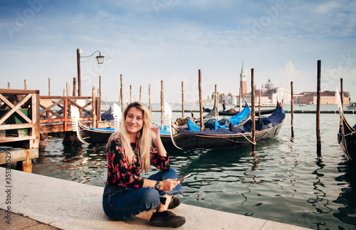 girl sitting on a street of Venice © Alisa