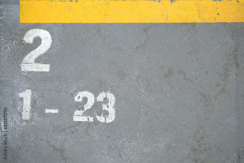 Fototapeta premium Marking at the stadium indicating the places and number. The concept of sport, sporting event. Places for fans and fans. Row 2, places 1 to 23