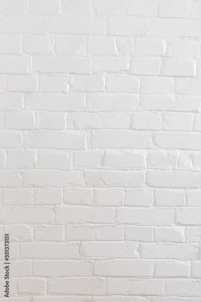 Naklejka premium white painted brick wall in white paint