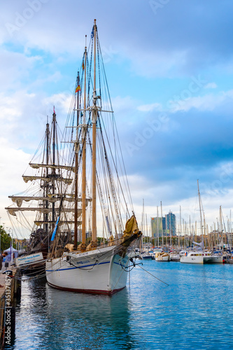 Barcelona, Spain. The schooner Santa Eulalia ship docked in Moll de la Fusta quay at Maritime Museum (Museu Maritim). A restored historical sailing vessel with a 3 mast/ masted rig. photo