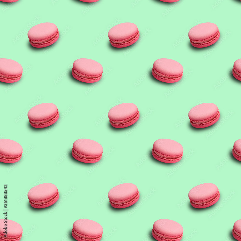 Pastel color seamless pattern with french pink macarons Pastel color seamless pattern with french pink macarons