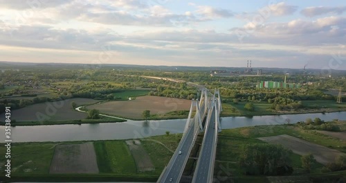 Bridge of Cardinal Franciszek Macharski in Krakow at sunset. photo