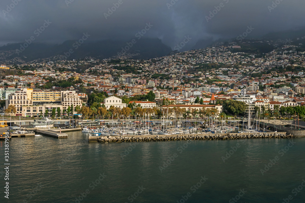  Funchal bay and Avenida do Mar with the buildings of the Marina Shopping and Baltazar Dias Theatre in  Madeira, Portugal