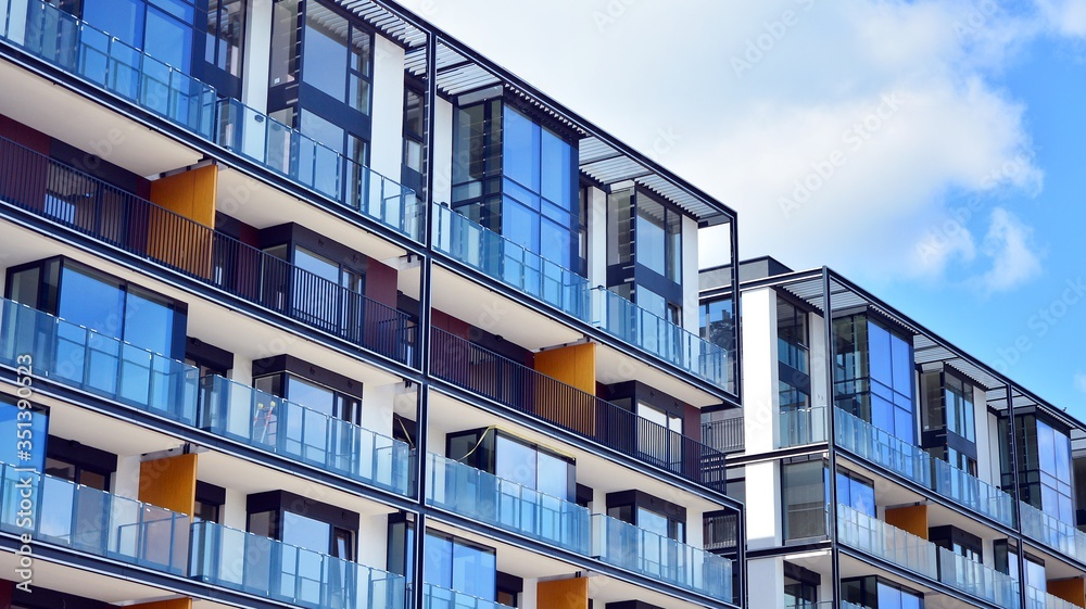 Obraz premium Modern European residential apartment buildings quarter. Abstract architecture, fragment of modern urban geometry.