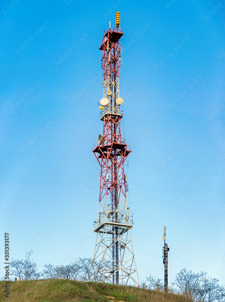 radio tower on a hill on blue sky background 3g 4g 5g