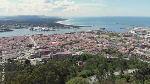 AERIAL DRONE FOOTAGE from the top of the Santa Luzia hill. Aerial view of Viana do Castelo and Limia River in Northern Portugal.