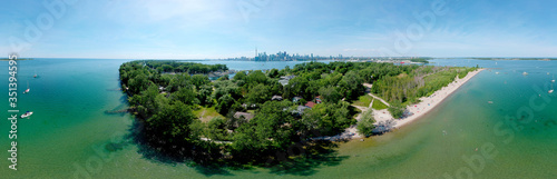Photography Toronto Central Islands and Ward's Island Park beach, Ontario, Canada, aerial view from top at sunny greenery and sandy coast with boats, people swimming at summer