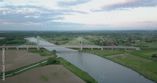 Bridge of Cardinal Franciszek Macharski in Krakow at sunset. photo