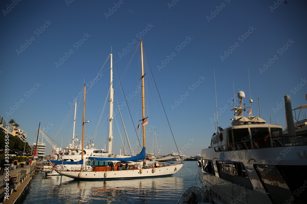 Fototapeta premium Principality of Monako. View of seaport with yachts and speedboats. Winter, low season.