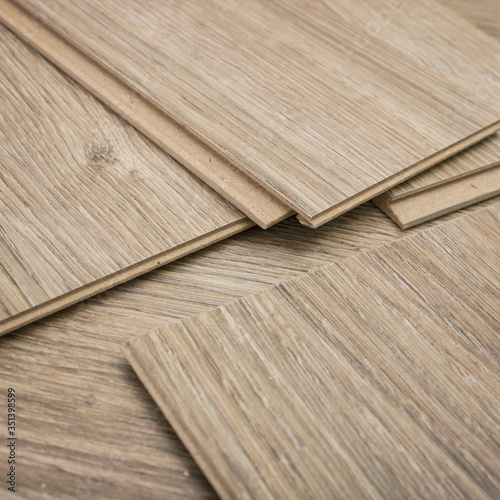 Trimming laminate, stylized oak wood. Repair of the flooring