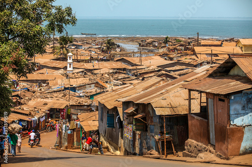 Flimsy shacks with corrugated tin roofs make up a township near the coast of Freetown, Sierra Leone, West Africa.