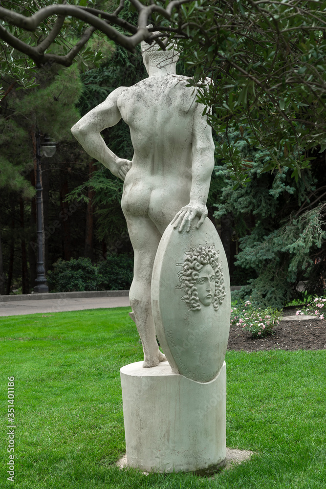 Alushta, Russia - July 29, 2016: Marble statue of an athlete of Greek mythology in the landscape park of the Aivazovsky sanatorium in Partenit in Crimea