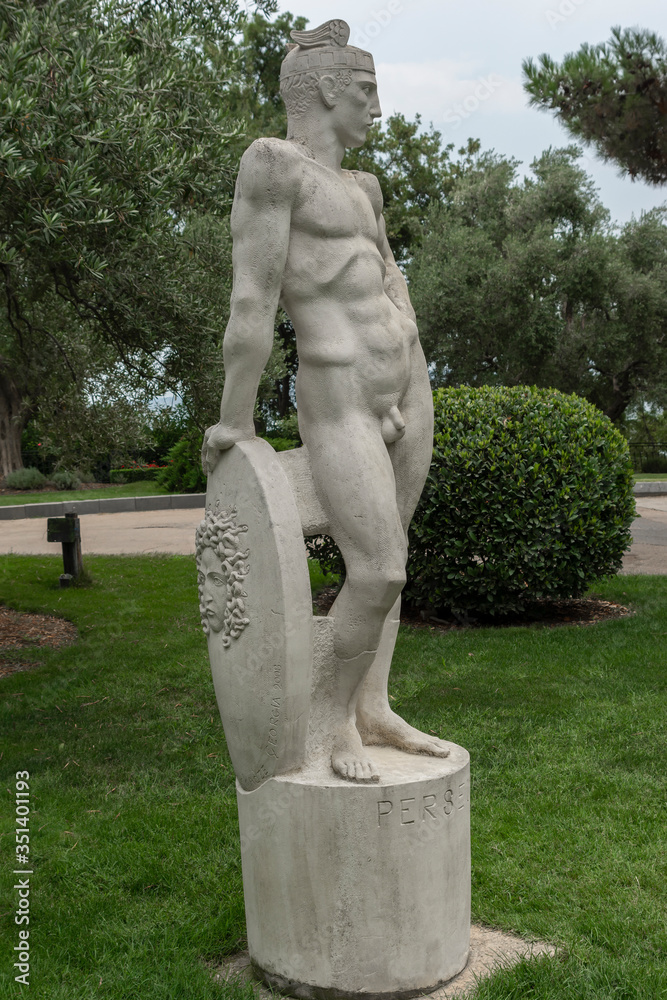 Alushta, Russia - July 29, 2016: Marble statue of an athlete of Greek mythology in the landscape park of the Aivazovsky sanatorium in Partenit in Crimea