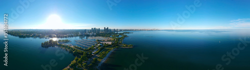Amazing North American panorama at Humber Bay Shores Park city and green space, skyline cityscape, yacht and boats in azure lake Ontario. Skyscrapers and blue marina, sunset at summer, Ontario, Canada photo