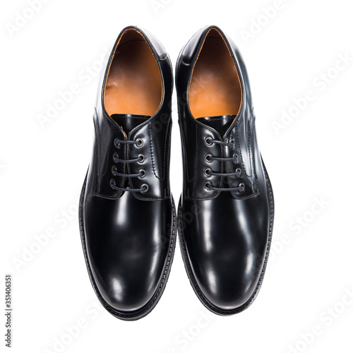 leather men's glossy autumn shoes, object isolated on a white background, clothing accessory.