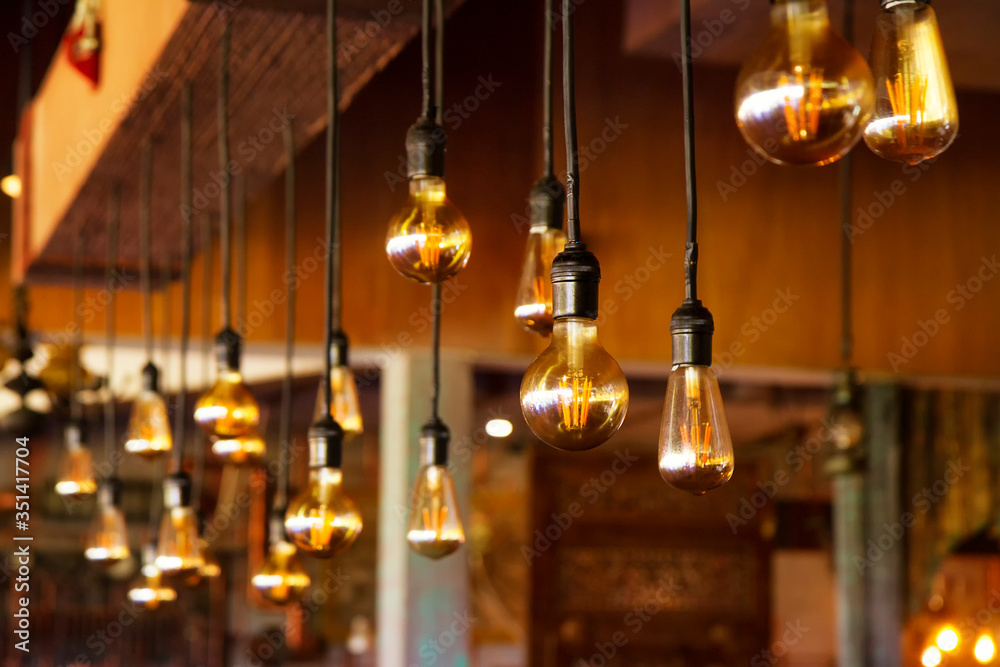 hanging vintage light bulb. cafe interior decoration