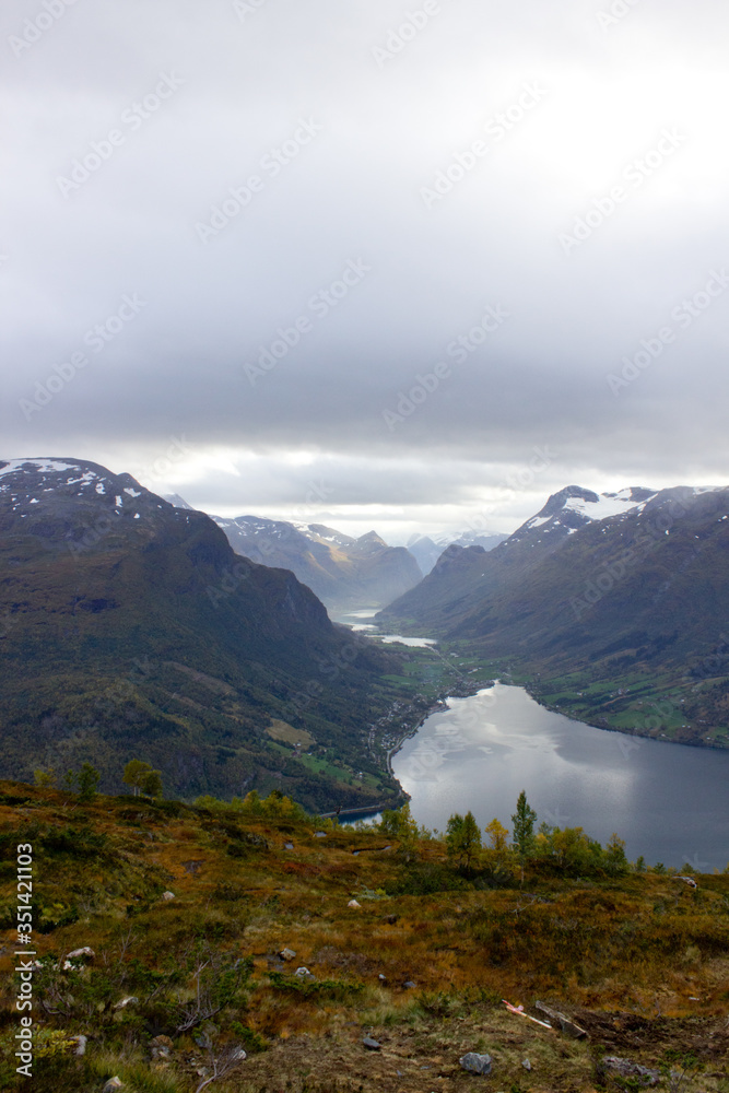 Scenic view of valley and nordfjord near Via ferrata at Loen,Norway with mountains in the background.norwegian october morning,photo of scandinavian nature for printing on calendar,wallpaper,cover