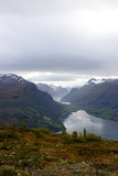 Scenic view of valley and nordfjord near Via ferrata at Loen,Norway with mountains in the background.norwegian october morning,photo of scandinavian nature for printing on calendar,wallpaper,cover