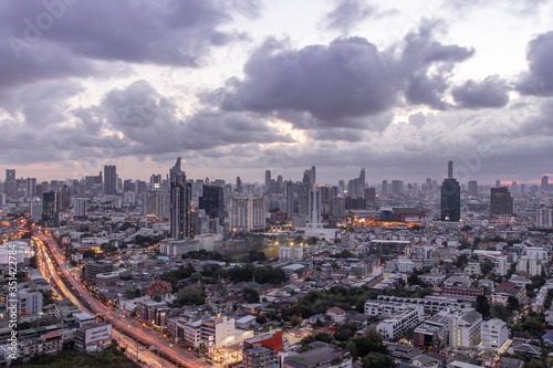 Sky view of Bangkok with skyscrapers in the business district in Bangkok in the evening beautiful twilight give the city a modern style.