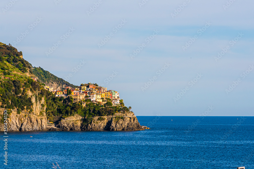 Sea of Cinque Terre, in Italy with Manarola town at background. Sea of Cinque Terre, in Italy with Manarola town at background.