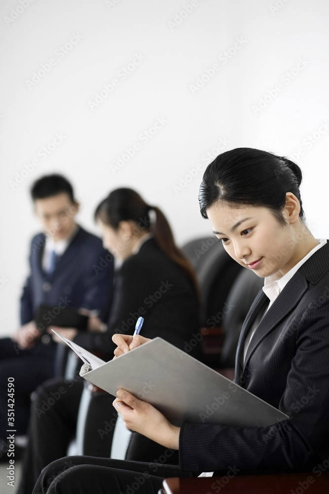 Businesswoman reading document Businesswoman reading document