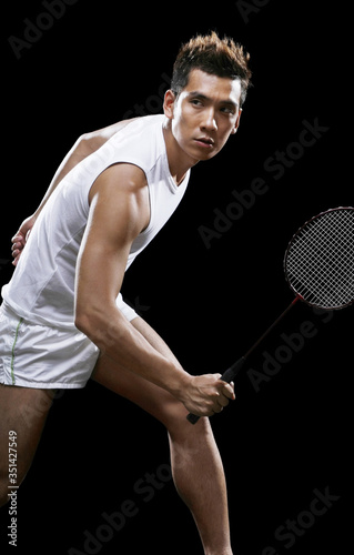 Man playing badminton © ImageHit
