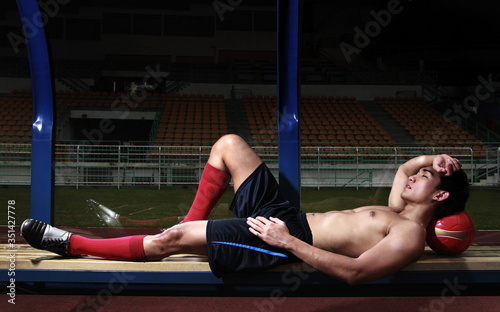 Man lying down on the bench