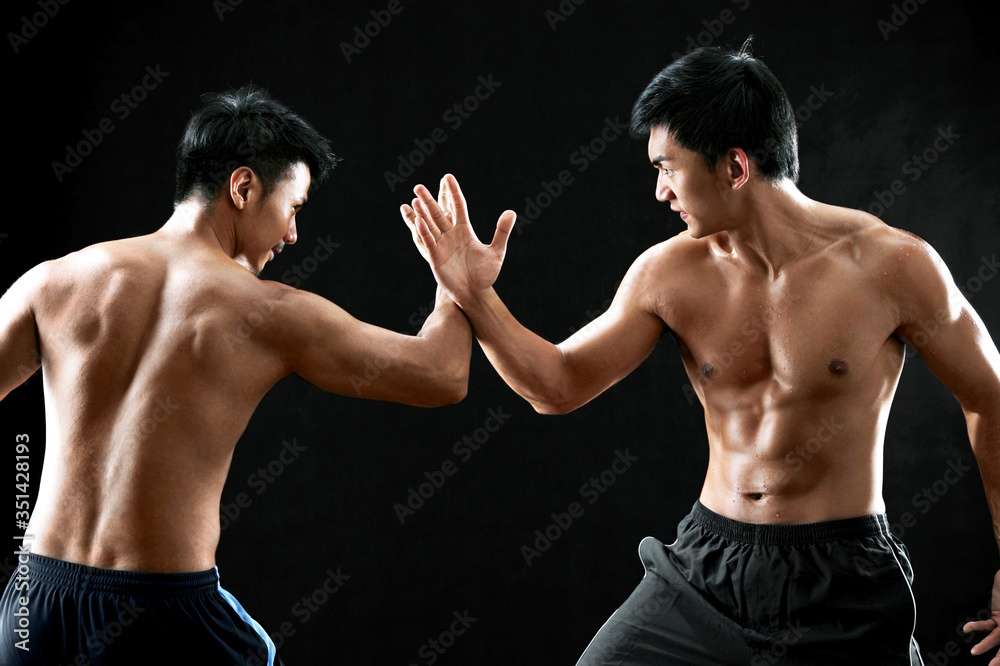 Men in combat position Men in combat position