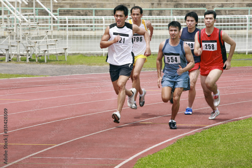 Men in track event